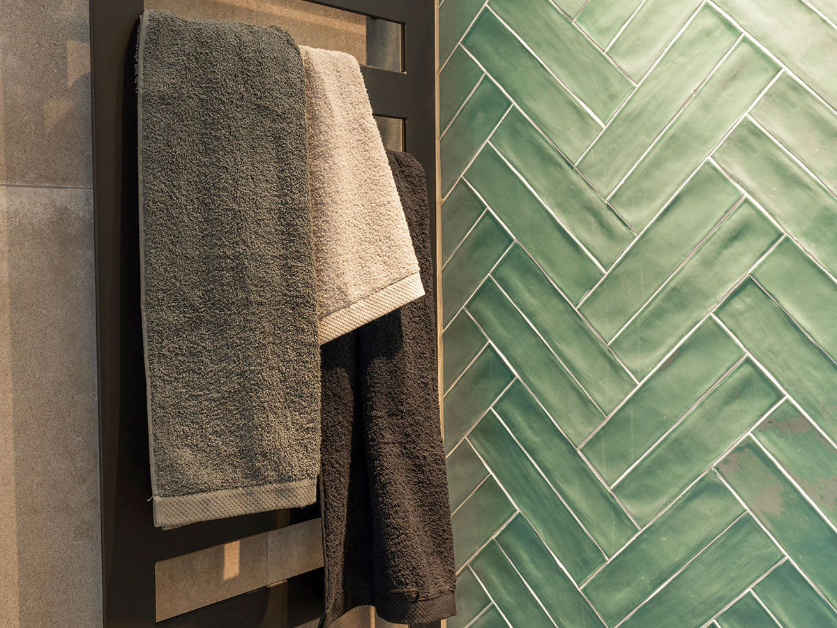 Het verschil tussen handdoeken en badlakens