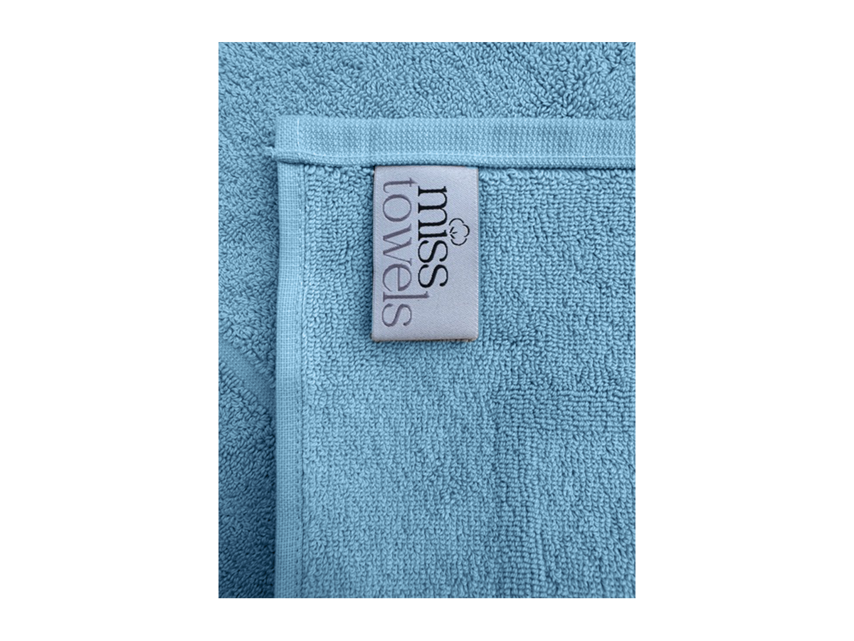 Luxe hotel badmat hemelsblauw label 